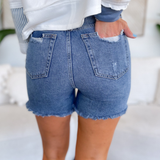 Sutton High Rise Distressed Denim Shorts