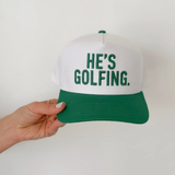 He's Golfing White/Green Trucker Hat