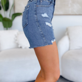 Sutton High Rise Distressed Denim Shorts