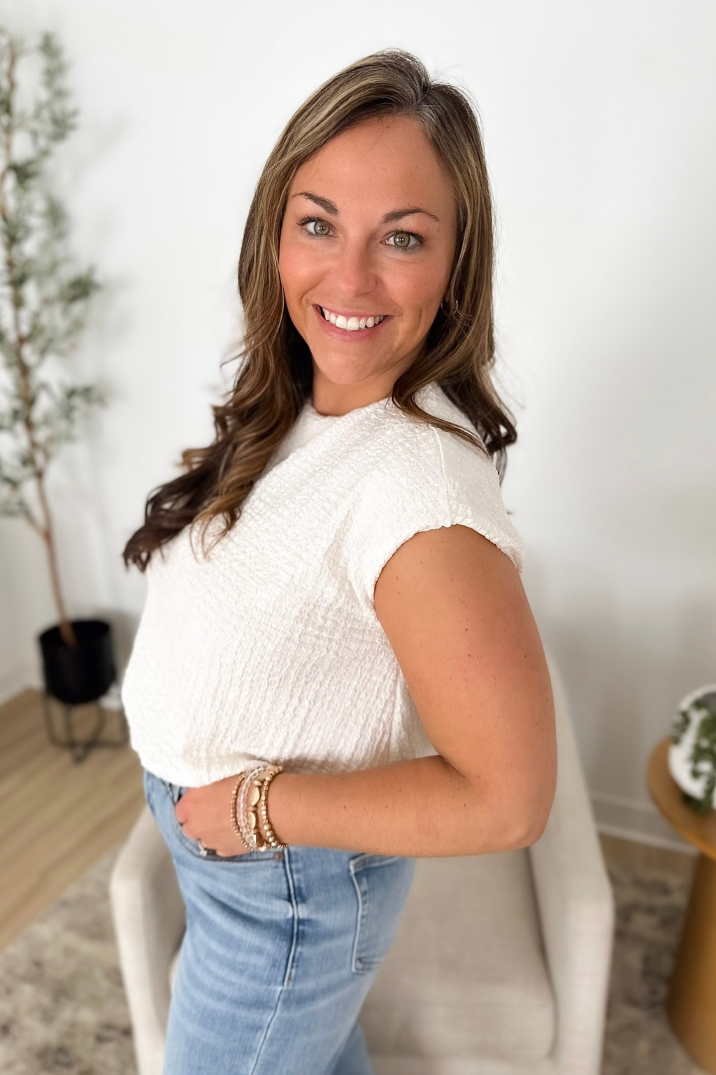 Sleeveless Puffy Hemline Cream Textured Top